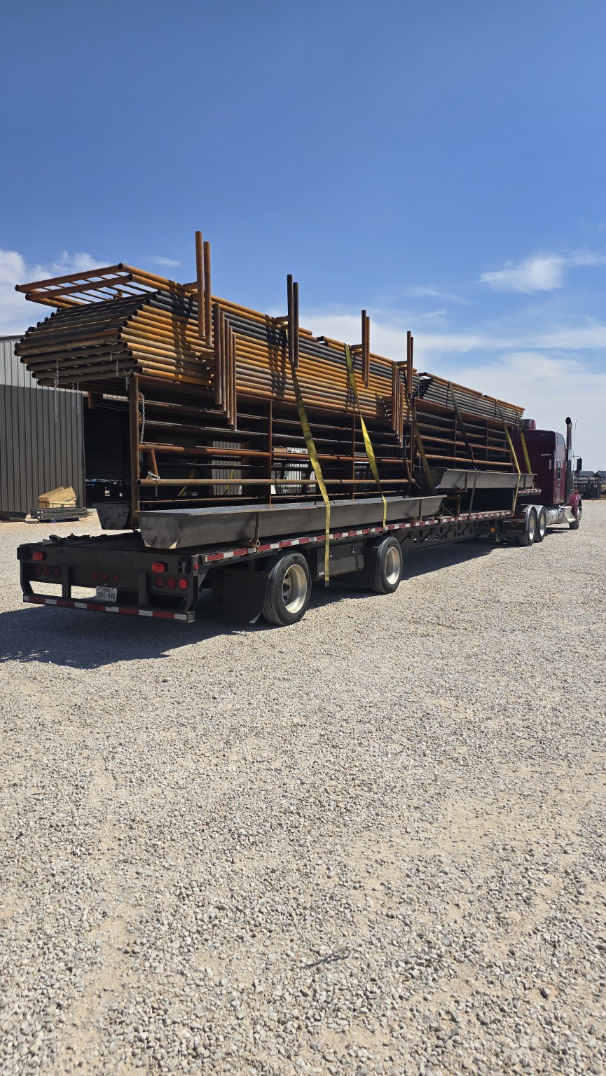 TX Panels equipment being loaded with a telehandler