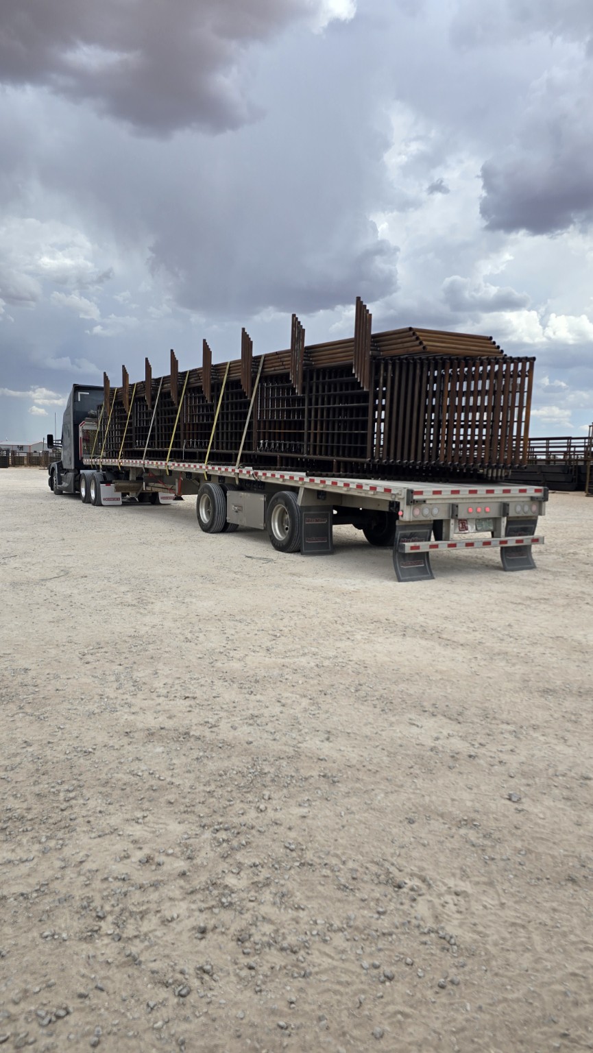 Semi truck hauling TX Panels livestock equipment