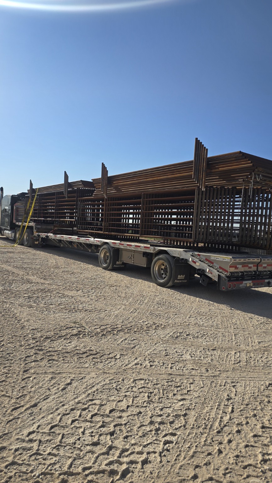 Heavy-duty livestock equipment stacked for delivery