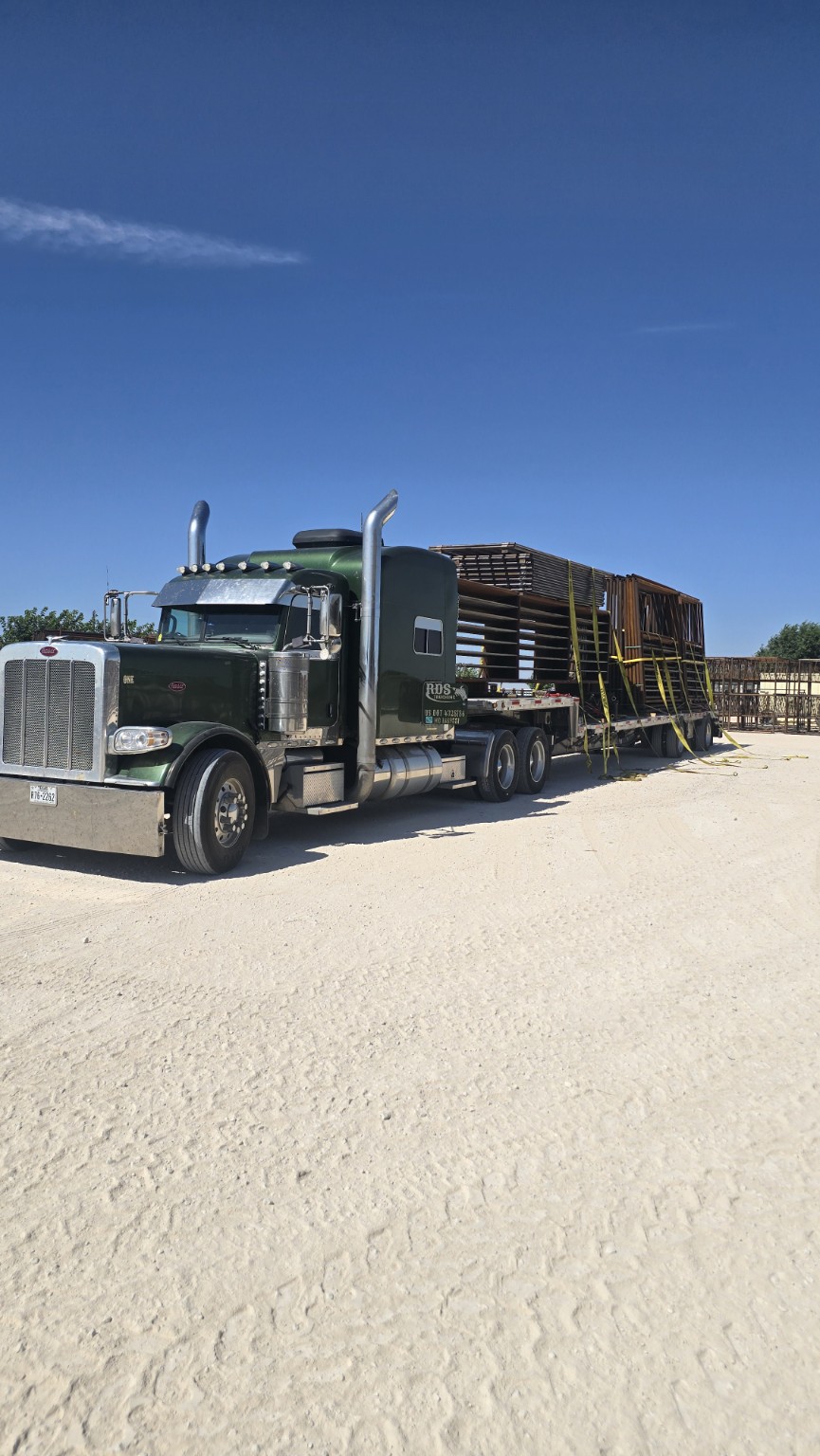 Peterbilt hauling TX Panels livestock equipment