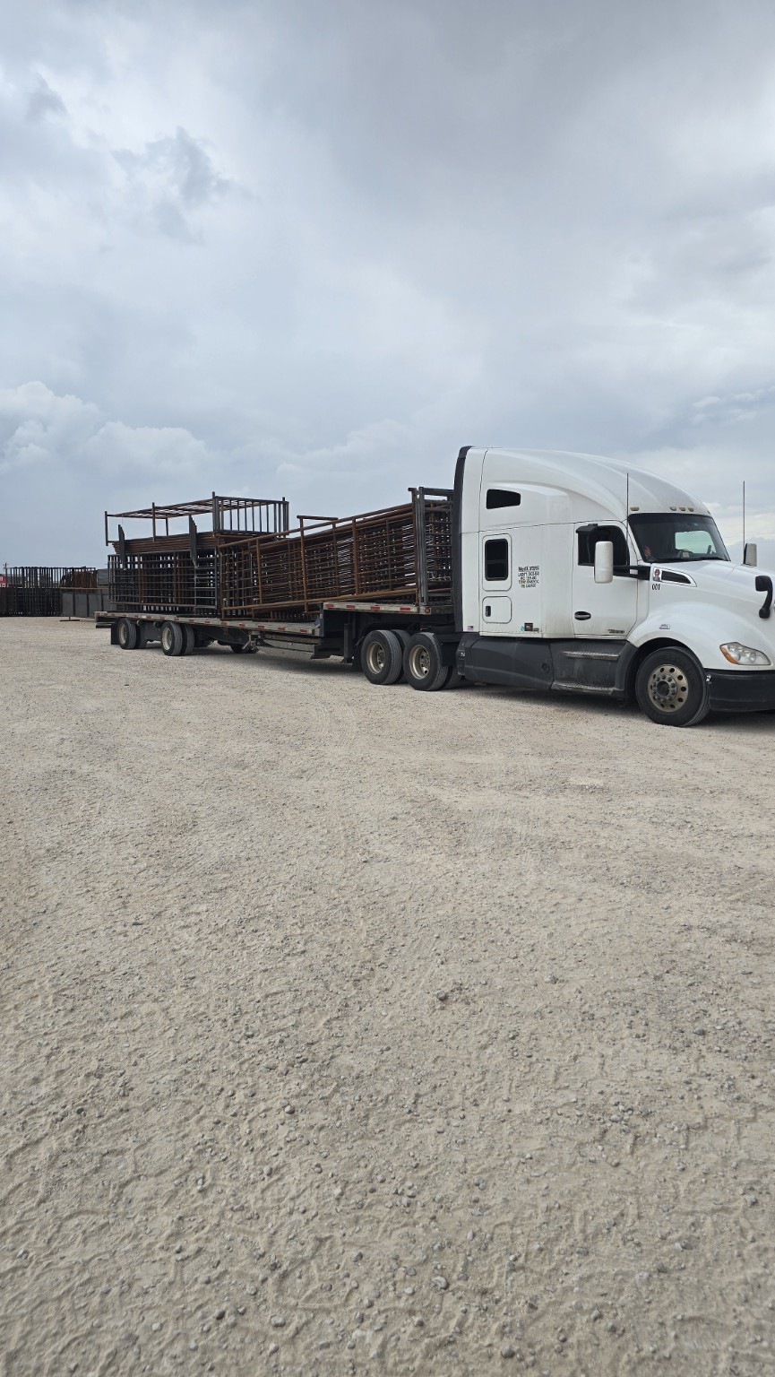White semi loaded with TX Panels equipment